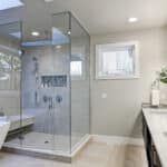 Shower with plumbing in an exterior wall