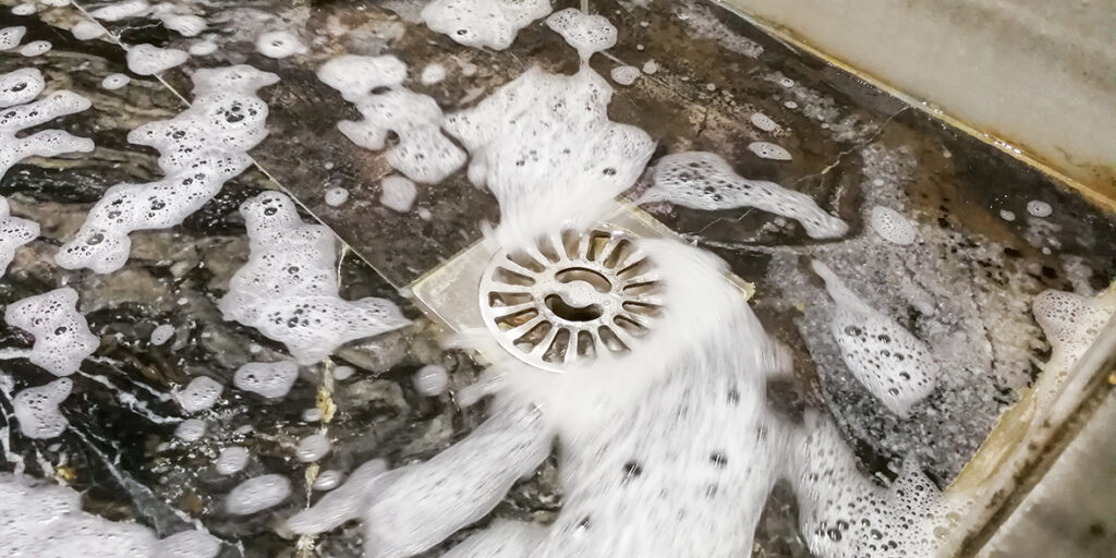 Water coming up from shower drain