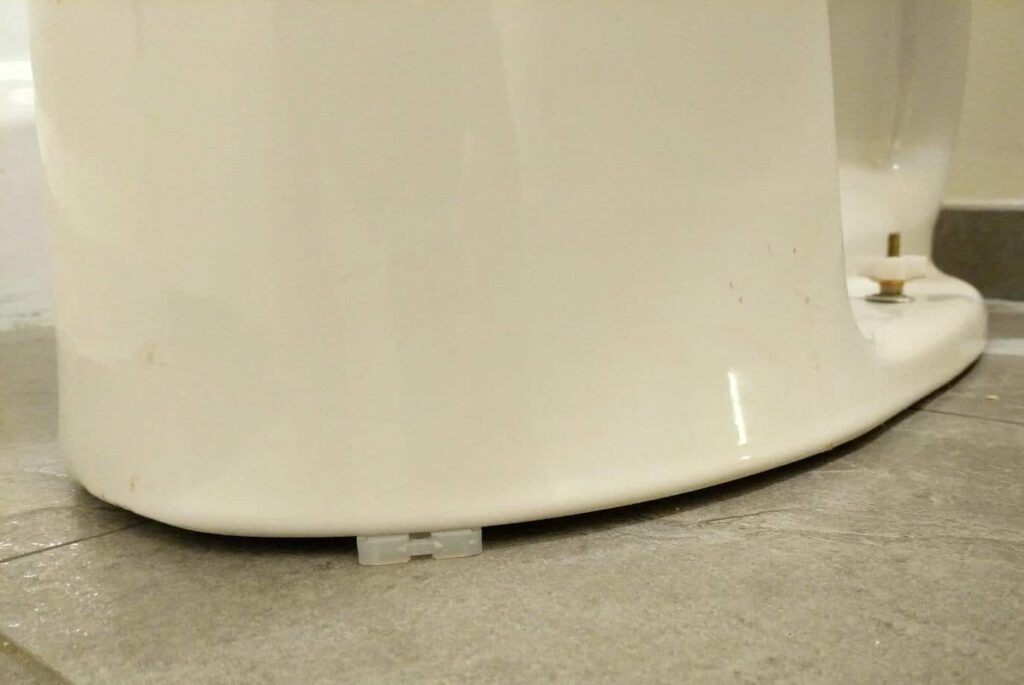 How to Fix a Rocking Toilet Causes of a Rocking Toilet